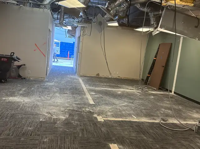 Commercial office gutted down to the ceiling structure